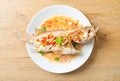Steamed grouper fish with lime and chillies Royalty Free Stock Photo