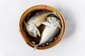 Steamed Mackerel in basket on white background