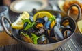 Steamed mussels in a pot. Delicious seafood plate Royalty Free Stock Photo