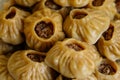 Steamed national Mongolian food dumpling Buuz filled with minced beef, white plate, wooden table, Close up east Siberian Buryats