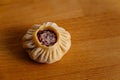 Steamed national Mongolian food dumpling Buuz filled with minced beef, wooden table, Close up east Siberian Buryats dish poses,