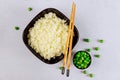 Steamed plain rice in black bowl on white background Royalty Free Stock Photo