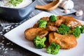 Steamed pork with balsamic vinegar and roasted broccoli and rice Royalty Free Stock Photo