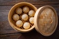 Steamed pork buns in bamboo steamer