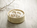 Steamed Prawn Dumpling Ha Kau served in a wooden bowl isolated on mat side view on grey background