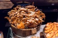 Steamed prawns in wooden bucket by prawn on ice