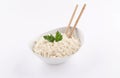 Rice bowl with chopstick and parsley