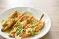 steamed river shrimp dressing spicy and sour lemon sauce on plate Royalty Free Stock Photo