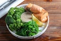 Steamed salmon with broccoli and seaweed salad. Diet healthy eating. On a dark background Royalty Free Stock Photo