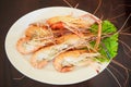 Steamed Seafood from sea market, Fresh Tasty Appetizing Cooked Tiger Prawns on Wooden Table Background. Food, Nutrition, Allergy, Royalty Free Stock Photo