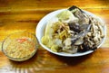 Steamed snake head fish with mushroom and slice ginger dipping spicy soy bean sauce Royalty Free Stock Photo