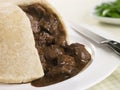 Steamed Steak and Kidney Pudding with Green Beans Royalty Free Stock Photo
