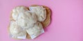 Steamed stuff bun on pink background. Royalty Free Stock Photo