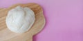 Steamed stuff bun on pink background. Royalty Free Stock Photo