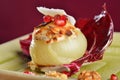 Steamed stuffed onions with goat cheese