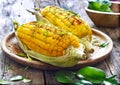 Steamed sweet corn with ingredient herb on wooden plate