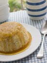 Steamed Syrup Sponge with a jug of Custard Royalty Free Stock Photo