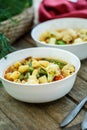 Steamed vegetables in a bowl on wooden table Royalty Free Stock Photo