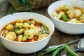 Steamed vegetables in a bowl on wooden table Royalty Free Stock Photo