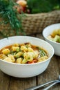 Steamed vegetables in a bowl on wooden table Royalty Free Stock Photo