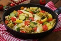 Steamed vegetables with chicken fillet in pan. Royalty Free Stock Photo