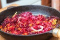 Steamed vegetables on a frying pan