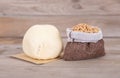 A steamed white noodle bun and a small bag of ripe wheat Royalty Free Stock Photo