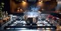 Steaming and boiling pan of water on heating stove in modern kitchen, Water Boiling Stainless pot on a gas Royalty Free Stock Photo