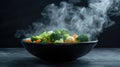 Steaming bowl of mixed vegetables with broccoli, carrots, and cauliflower