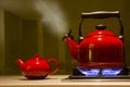 Boiling Red Kettle With Red Teapot