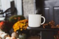 Steaming Coffee Cup on Arm of Rocking Chair Royalty Free Stock Photo