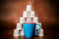 Steaming Coffee and Pod Pyramid Copper Background Royalty Free Stock Photo