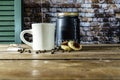 Steaming cup of coffee cigarettes and fruit cookies Royalty Free Stock Photo