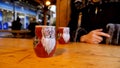 Steaming Cup of Hot Mulled Gluehwein at German Market in British Town