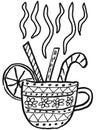 A steaming cup of hot winter drink with lemon, cinnamon and candies