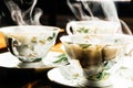 Steaming cups of coffee