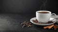 Steaming espresso cup with fragrant cinnamon and roasted coffee beans for aromatic delight Royalty Free Stock Photo