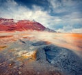 Steaming fumarole in geothermal valley Hverarond, located near Reykjahlid village