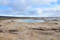 Steaming geyser in a field in Haukadalur Iceland