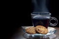 Steaming hot black coffee with chocolate chip cookies Royalty Free Stock Photo