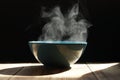 Steaming of hot food soup in a bowl. Royalty Free Stock Photo