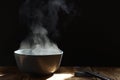 Steaming of hot food soup in a bowl. Royalty Free Stock Photo