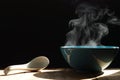 Steaming of hot food soup in a bowl. Royalty Free Stock Photo