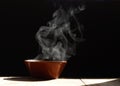 Steaming of hot food soup in a bowl. Royalty Free Stock Photo