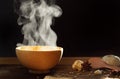 Steaming of hot food soup in a wooden bowl. Royalty Free Stock Photo