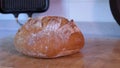 Slide past steaming hot freshly baked artisan sourdough bread