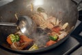 Steaming mixed vegetables in the wok, asian style cooking vegetarian and healthy, selected focus. Royalty Free Stock Photo