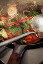 steaming mixed vegetables in the wok, asian style cooking vegetarian and healthy, selected focus. Royalty Free Stock Photo