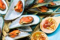 Steaming mussel With delicious sauce on dish with wood table seafood style