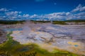 Steaming opaque thermal pools at Norris Geyser Basin. Yellowstone National Park, Wyoming Royalty Free Stock Photo